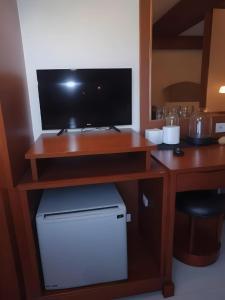 Kuchyň nebo kuchyňský kout v ubytování Hack Patong Beach Hotel