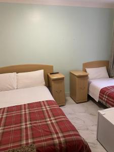 Postel nebo postele na pokoji v ubytování European Hotel