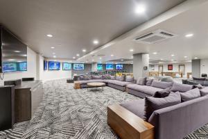 a large living room with couches and a flat screen tv at 304 - Black Rock Mountain Resort in Heber City