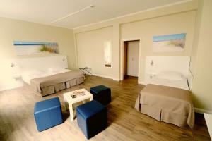 Postel nebo postele na pokoji v ubytování Hotel am Kieler Schloss by Première Classe