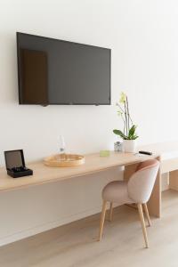 TV a/nebo společenská místnost v ubytování Hotel RH Ifach