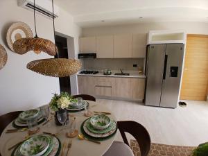 Kuchyň nebo kuchyňský kout v ubytování Caribbean Apartment + 1 fotografie