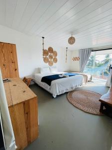 Postel nebo postele na pokoji v ubytování Casa Éolica