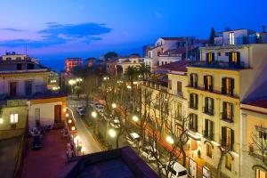 a view of a city street at night at Hotel Villa Di Sorrento in Sorrento