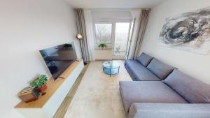 Χώρος καθιστικού στο Lichterfülltes Apartment mit WLAN