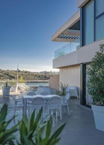 Balkón nebo terasa v ubytování Alojamientos Turísticos Puerto de Suances junto a la playa, terraza y garaje privado