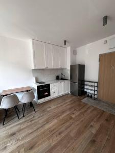 Η κουζίνα ή μικρή κουζίνα στο A63 by Real Apartment