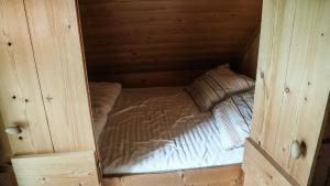 Postel nebo postele na pokoji v ubytování Wijndomein Erve Wisselink