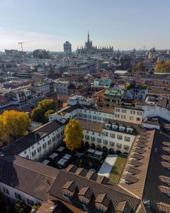 Nespecifikovaný výhled na destinaci Milán nebo výhled na město při pohledu z hotelu