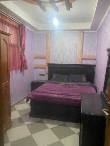 Ένα ή περισσότερα κρεβάτια σε δωμάτιο στο Fleur de cactus Appartement 2 chambres +3 φωτογραφίες