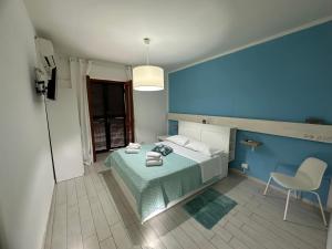 Postel nebo postele na pokoji v ubytování B&B Phistelia