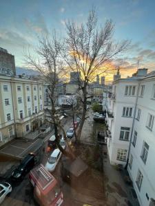 a view of a city with cars parked in a parking lot at Fantastic-Inn Warszawa - Chmielna in Warsaw