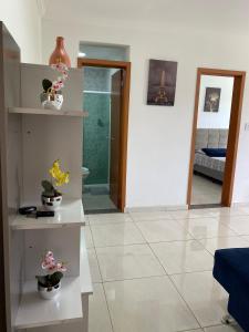 Ένα ή περισσότερα κρεβάτια σε δωμάτιο στο Novo apartamento em São Lourenço