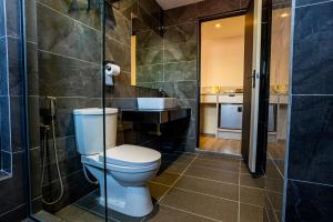 Koupelna v ubytování De Quinton Hotel