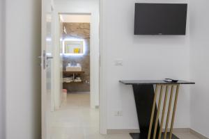 ADAMAS apartment , rooms and suite的电视和/或娱乐中心