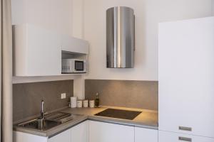 ADAMAS apartment , rooms and suite的厨房或小厨房