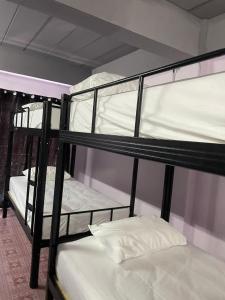 Ένα ή περισσότερα κρεβάτια σε δωμάτιο στο Bed & Breakfast Pattaya +18 φωτογραφίες