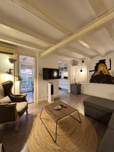 TV a/nebo společenská místnost v ubytování Rosselló Apartment