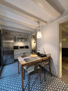 Kuchyň nebo kuchyňský kout v ubytování Rosselló Apartment