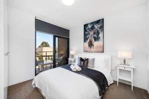 Postel nebo postele na pokoji v ubytování The Beaufort Escape A Sepal Select Stay