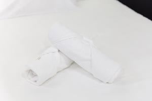 a roll of white toilet paper on a white background at Saint Michel in Paris +8 photos
