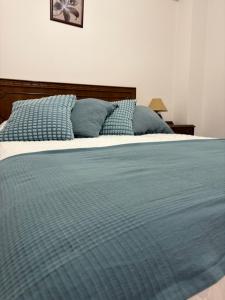 Postel nebo postele na pokoji v ubytování Hostal San José Naval