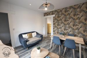 Et opholdsområde på La maison citadine, avec garage + 13 billeder