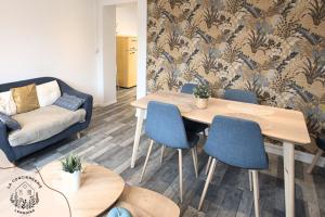 Et opholdsområde på La maison citadine, avec garage