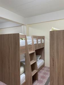 Ένα ή περισσότερα κρεβάτια σε δωμάτιο στο Bed & Breakfast Pattaya