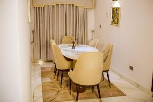 Posezení v ubytování TAJ Suites