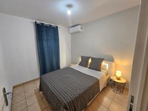 Postel nebo postele na pokoji v ubytování NEW Appart 2 chambres avec piscine proche aeroport