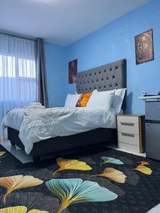 Postel nebo postele na pokoji v ubytování Eden Villas Guesthouse
