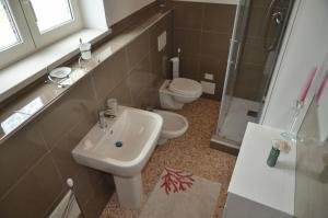 Koupelna v ubytování Palazzo Maggiore Suite B