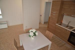 Kuchyň nebo kuchyňský kout v ubytování Palazzo Maggiore Suite B