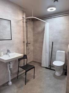Koupelna v ubytování Torget Vandrarhem + 37 fotografií