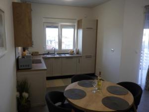 Η κουζίνα ή μικρή κουζίνα στο Cozy Apartment Bili