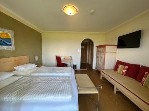 Letto o letti in una camera di Bio-Hotel Schiessentobel