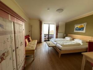 Letto o letti in una camera di Bio-Hotel Schiessentobel