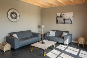 Posezení v ubytování Wertemerhoeve Vakantiewoningen