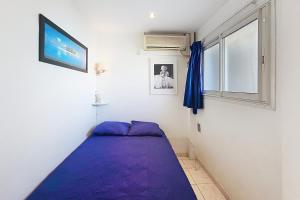 Ένα ή περισσότερα κρεβάτια σε δωμάτιο στο AHC - Versailles- 2 pièces centre ville