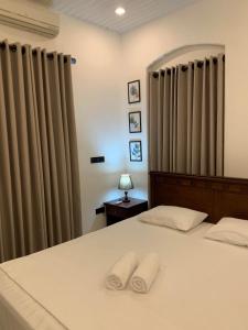 Voodi või voodid majutusasutuse Leena Holiday Home toas