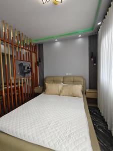 Postel nebo postele na pokoji v ubytování Cosy Nest Royal Oceancrest Mactan + 5 fotografií