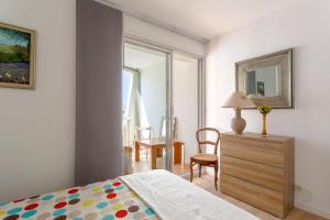 Giường trong phòng chung tại Chez Françoise Fr - Spacieux appartement vue imprenable avec ascenseur