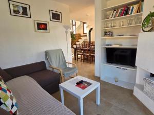 TV a/nebo společenská místnost v ubytování El Mirador de El Paso - Vistas y piscina