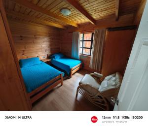 Postel nebo postele na pokoji v ubytování HelChiloé Cabañas