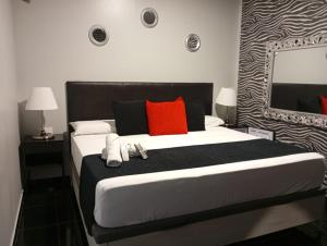 Postel nebo postele na pokoji v ubytování Apartamentos Rous - Solo adultos