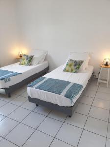Postel nebo postele na pokoji v ubytování Le Relais de Saint-Denis