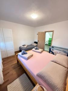Postel nebo postele na pokoji v ubytování Apartments Marija