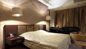 Postel nebo postele na pokoji v ubytování Hotel Cezaria + 37 fotografií