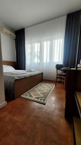 Postel nebo postele na pokoji v ubytování Pri Rooms